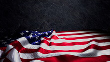 USA Flag Banner For Memorial Day On Black Rock. Authentic Holiday Background With Copy-Space.