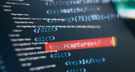 Wall Mural - website html code on the laptop display closeup photo. modern tech. innovative startup project.