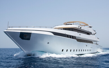 Wall Mural - Luxury private motor yacht under way sailing at sea