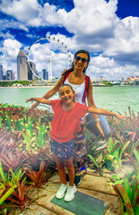 Sticker - Happy woman with her daughter visiting Singapore.