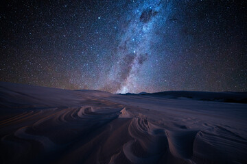 milky way over sand dunes at dark point, myall lakes national park, hawks nest, nsw, australia
