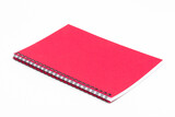 Fototapeta Na drzwi - Spiral notebook with red cover on white background