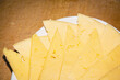 Delicious hard cheese. Healthy tasty food. Yellow cheese on a plate