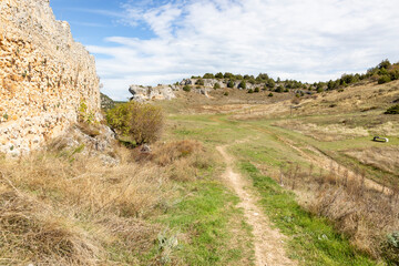 Wall Mural - hiking trail in front of the Castle of Ucero, province of Soria, Castile and Leon, Spain