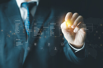 Wall Mural - system analyst or businessman drawing relational database tables. concept of database diagram design