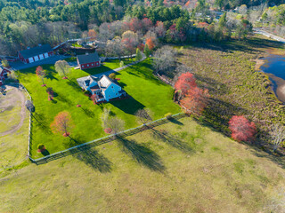 Wall Mural - aerial view of farm house in spring sunlight