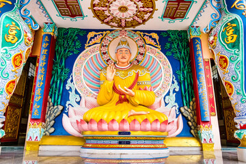 Wall Mural - Nakhon Sawan, Thailand - March, 23, 2022 : Buddha statue at Shrine Serpent king Chan Sen Is a Chinese style temple Created for people to worship gods.