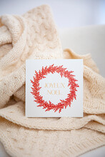 Christmas Card On White Blanket