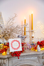Christmas Greeting Card And Decoration On Marble Fireplace
