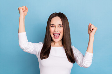 Sticker - Photo of hooray young brunette lady yell wear white shirt isolated on blue color background