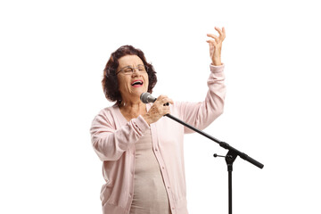 Senior woman singing on a microphone
