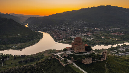 Wall Mural - Aerial view of Jvari Monastery before sunset