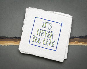 Wall Mural - It is never too late motivational reminder - handwriting on square sheet of handmade paper, business or personal development concept