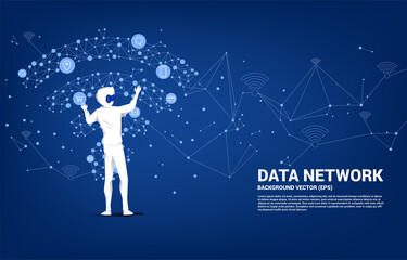 Poster - Silhouette businessman wear VR glasses with dot connect line polygon mobile data icon. Concept of digital virtual reality technology and AR .