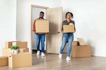 Wall Mural - African American Spouses Entering Their New Apartment Holding Moving Boxes