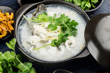 Poster - Chinese cuisine; Congee with fish slices in casserole