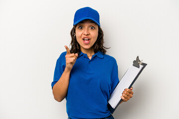 Wall Mural - Young hispanic woman delivery man isolated on white background having an idea, inspiration concept.