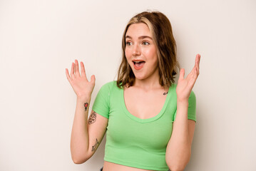 Wall Mural - Young caucasian woman isolated on white background joyful laughing a lot. Happiness concept.