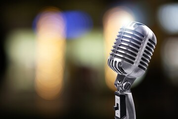 Wall Mural - Retro Microphone For Karaoke. Retro Mic on De focused Abstract Background