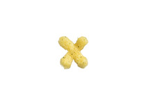 Puffed Corn Snack In Shape Of Letter X Isolated On White Background. Corn Snacks With Onion Flavor.