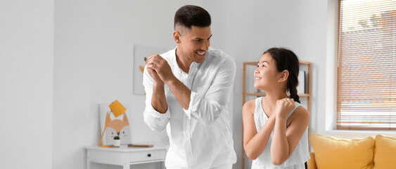 Poster - Man and his little daughter dancing at home