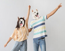 Funny Dancing Dogs With Human Bodies On Grey Background