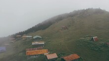 The Drone Flies Over The Fog. Nature And Village