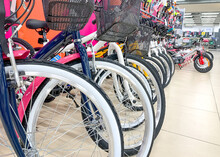 Bicycles On Sale In Sports Retail Store. Physical Shopping Concept.