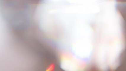 Wall Mural - Iridescent Flickering of Gemstone Faces. Loop. The light passes through the facets of a slowly rotating diamond and creates repetitive sparkling highlights and rainbow colors