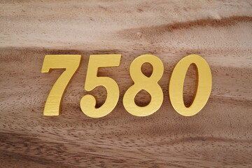 Number 7580 is made of 1 cm thick teak, painted gold on top of real wood with dark brown to light brown patterns to show the dimensions of the picture.