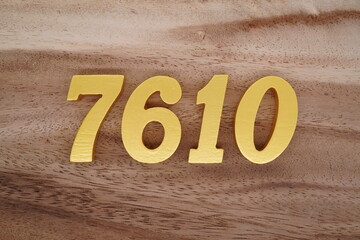 Number 7610 is made of 1 cm thick teak, painted gold on top of real wood with dark brown to light brown patterns to show the dimensions of the picture.