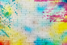 Abstract Colorful Graffiti Drawn On White Brick Wall