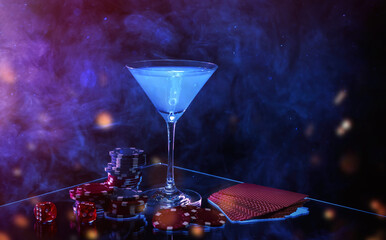 Poster - Casino chips, dice, playing cards and cocktail on dark background with smoke