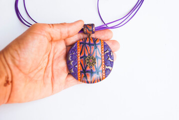 Wall Mural - Boho style purple bronze necklace of polymer clay. Handmade jewelry.