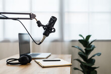 Condenser Microphone In Recording Home Studio. Content Creator Working With Laptop Host Streaming Radio Podcast Interview Conversation At Home Broadcast Studio Recording Voice Over Radio