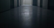 The Movement Of The Floor In The Dark Corridor Of The Prison. A Glare Of Light In The Menacing Floor, The Surface. There Is Light At The End Of The Corridor. Low Mental State.