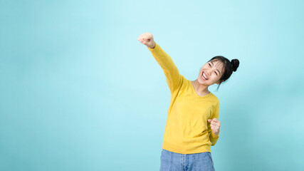 Young woman celebrate victory