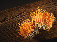Cordyceps Militaris Mushrooms, Mushrooms On An Old Wooden Chopping Board