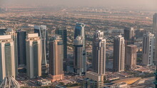 Jumeirah Lakes Towers District With Many Skyscrapers Along Sheikh Zayed Road Aerial Timelapse.