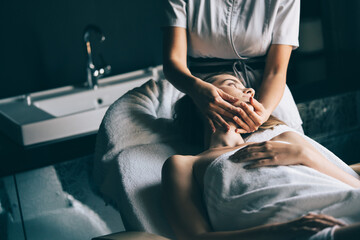 Wall Mural - Young beautiful woman having massage in spa salon