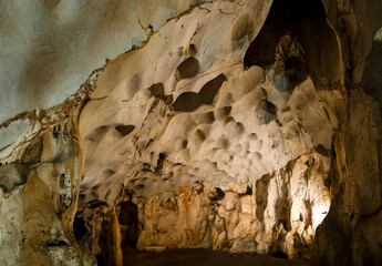 Wall Mural - Close up photo of rock formations in Karain cave in antalya turkey.