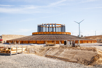 Construction site. concrete foundation of wind turbines with concrete and steel. building wind turbines. metalwork in the foundation of a wind turbine base. Wörrstadt, Germany