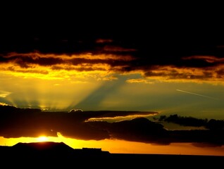 Wall Mural - Colored Clouds at Sunset