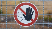 Close Up Of A No Entry (access Forbidden) Sign On A Metal Fence.