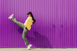 © Dani D.G - Woman in casual wear dancing on street