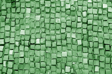 Color mosaic wall texture in green color.