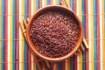 red rice in a bowl on table , haradighi rice 