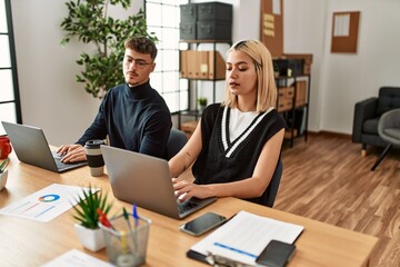 Canvas Print - Employee cheating laptop partner at the office.