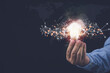 © Chaiwat - Innovation ideas and inspiration, and download or upload data by cloud computing concept. Businessman holding light bulb with cloud computing for download and upload database of business on hands.
