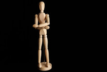 Beautiful Shot Of A Wooden Human Figure On A Black Background